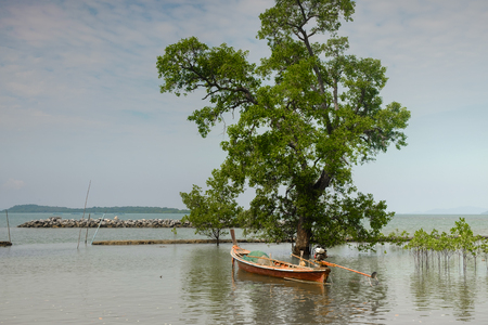 small fishing boat in the seaの写真素材