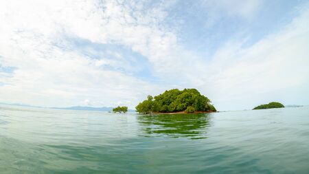 background of small island in the seaの写真素材