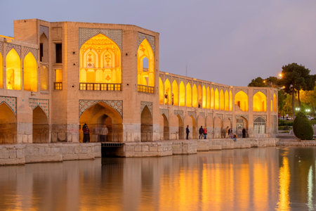 Iranian are rest at Pol-e Khaju bridge, 132 meter  long over Zayande river , since 1500 years ago, Esfahan, Iranの写真素材