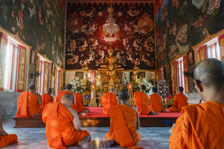 a number of  monks are pray for evening chant at Wat Bang Pai, Nontaburi province, Thailand, since 1766のeditorial素材