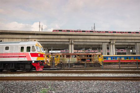 moving train and sky train in the rush hour evening time, Bangkok, Thailand