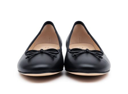 Black female shoes isolated on white background. Clipping path included.の素材