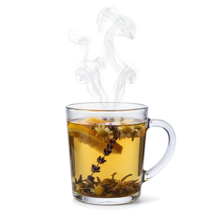 Cup of tea with lemon and herbs on a white background.の素材