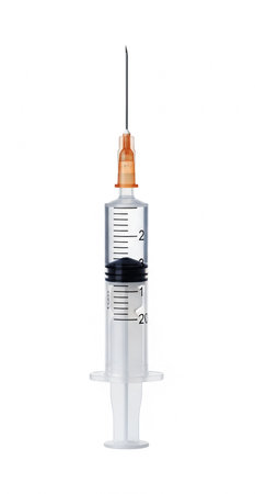 Medical syringe isolated on white background. Clipping path included.の素材