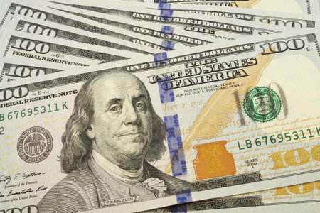 Pattern of one hundred dollar bills close-up 