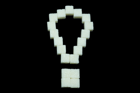 exclamation of  refined sugar on the black background - diabetes conceptの写真素材