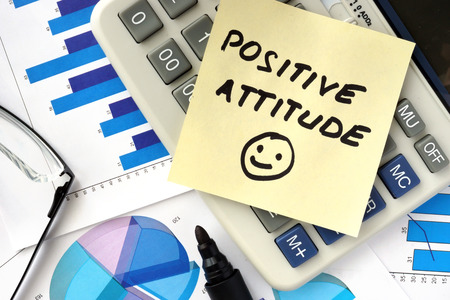 Papers with graphs and words positive attitudeの写真素材