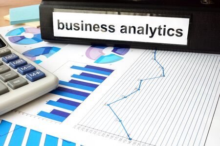 Folder with the label business analytics and chartsの写真素材