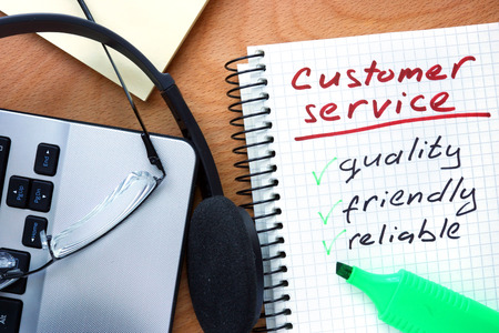 Notepad with words customer service.の写真素材