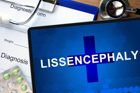 Diagnostic form with diagnosis Lissencephaly and pills.