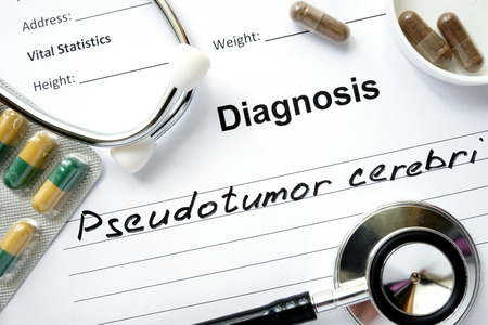 Diagnosis Pseudotumor cerebri, pills and stethoscope.の写真素材