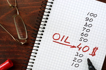 Oil price 40 dollars in a notepad. Business concept.の写真素材