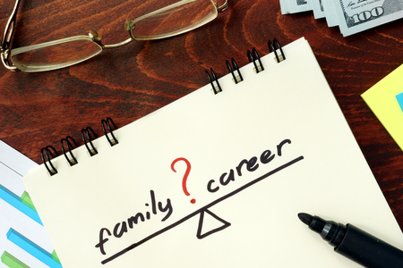 Words Career and family balance   written in the notepad.の写真素材