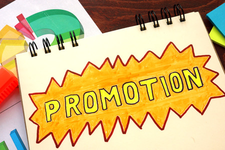 Promotion  concept. Notepad on the table.の写真素材