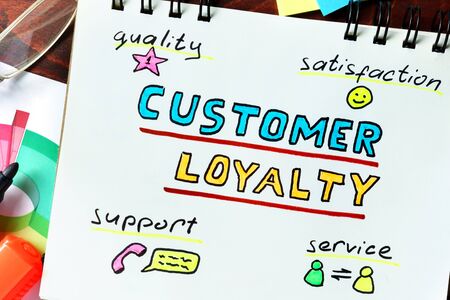 Customer Loyalty  concept. Notepad on the table.の写真素材