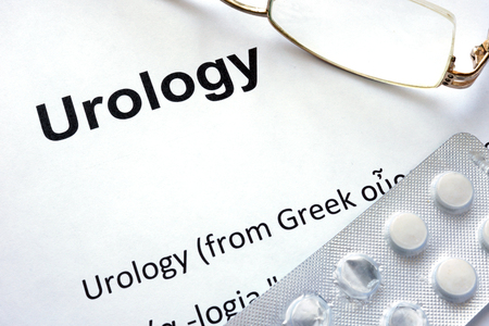 Paper with diagnosis Urology and glasses.の写真素材