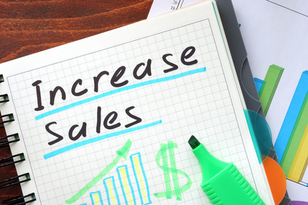 Increase sales concept  written in a notebookの写真素材
