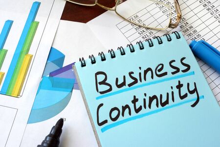 Business Continuity written on a notepad with marker.の写真素材