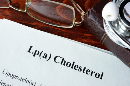 Papers with words Lp(a) Cholesterol on a table.の写真素材