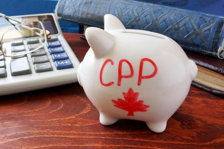 Piggy bank with word CPP. Canada Pension Plan concept.の写真素材