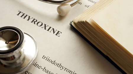 Document with title Thyroxine on a table.の写真素材