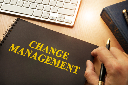 Book with change management on a table.の写真素材