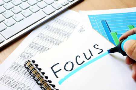 Focus written in a note. Business concept.の写真素材