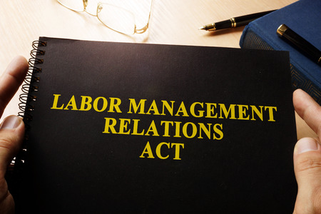 Labor Management Relations Act on an office table.の写真素材