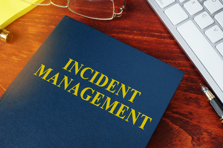 Incident Management concept. Book on the office desk.の写真素材
