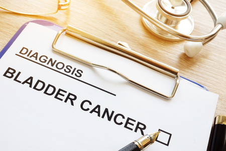 Diagnosis bladder cancer and pen on a desk.の写真素材