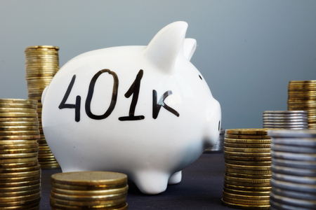 Retirement plan. Piggy bank with word 401k.の写真素材