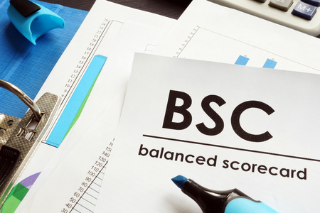 Documents about balanced scorecard BSC on a table.の写真素材
