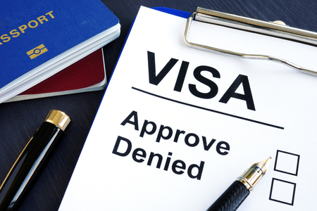Visa approve or denied and passport. Immigration.の写真素材