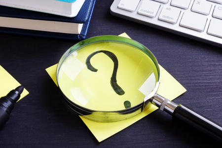 Question mark on a piece of paper. Problem solving.の写真素材