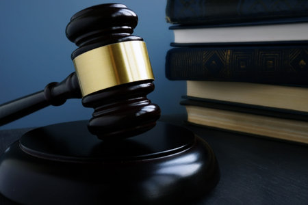 Justice concept. Gavel and law books in a court.