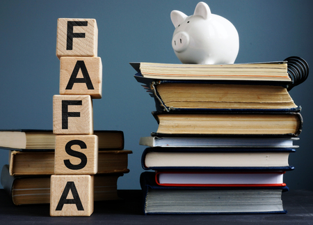 FAFSA Free application for federal student aid. Letters on the cubes.