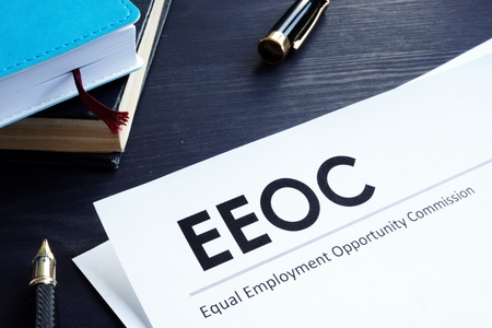 Equal Employment Opportunity Commission EEOC document and pen on a table.の写真素材