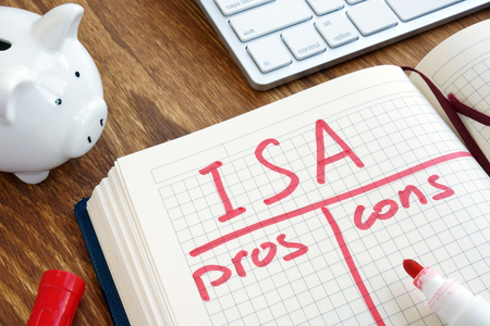 ISA Individual Savings Account pros and cons in the note pad.の写真素材