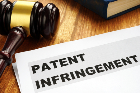 Patent infringement and gavel. Copyright law concept.の写真素材