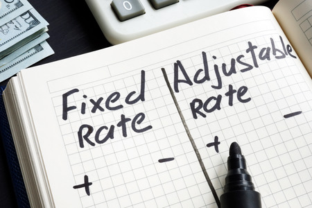 Fixed rate vs adjustable rate mortgage pros and cons.の写真素材