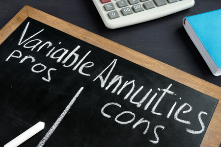 Variable Annuities pros and cons written on a blackboard.の写真素材