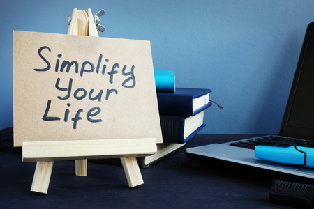 Simplify your life written on a piece of paper.の写真素材