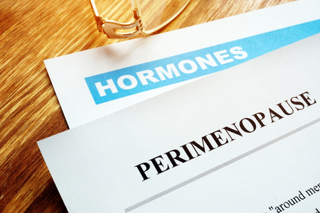Perimenopause and menopause concept. Documents about hormones.の写真素材