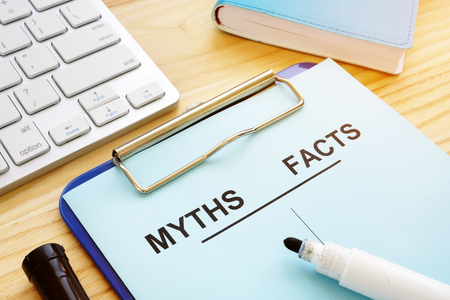 Myths and facts list with pen. Fake news concept.の写真素材
