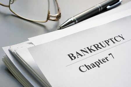 Chapter 7 Bankruptcy petition and glasses.の写真素材