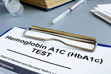 Hemoglobin A1C HbA1c Test form on desk.の写真素材