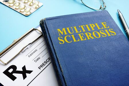 Multiple sclerosis MS book and prescription and pen.の写真素材