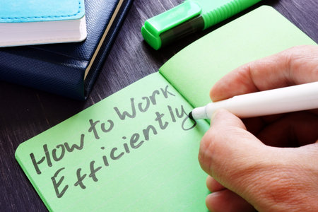 Man is writing How to Work efficiently.