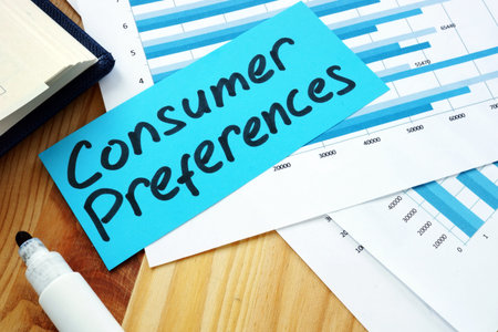 Measuring Consumer Preferences concept. Stack of papers with charts.