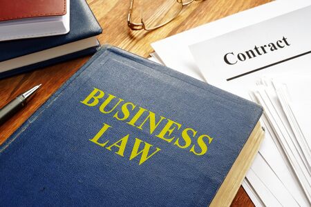 Business law book and corporate contract.の写真素材